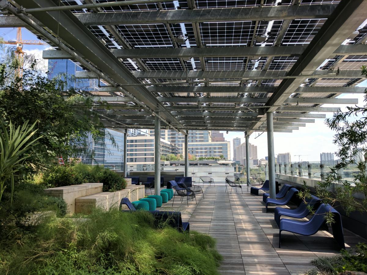 Outdoor patio at the new Central Library with solar panels as roof.